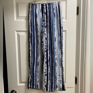 Blue pants with slits on sides, size small